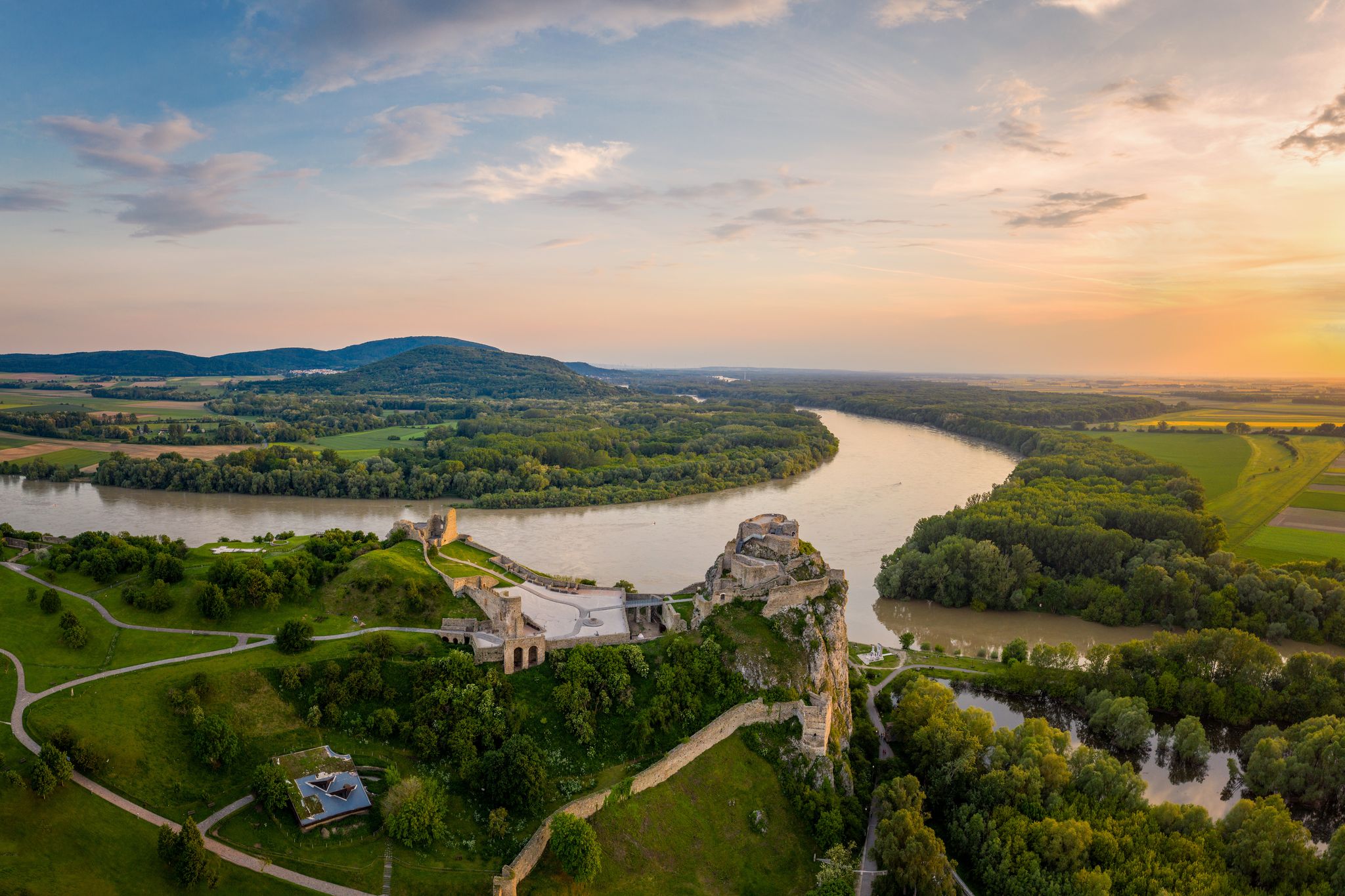 Devin Castle above the river Danube at sunset or sunrise.