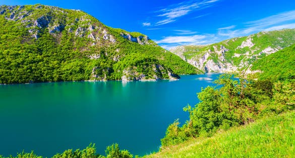 Photo of Lake Piva or Pivsko jezero is a reservoir near Pluzine town in Durmitor National Park in Montenegro.