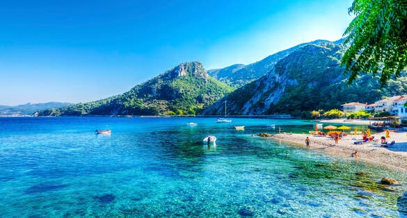 Photo of Avlakia beach with it's beautiful blue water in Samos Island, Greece.