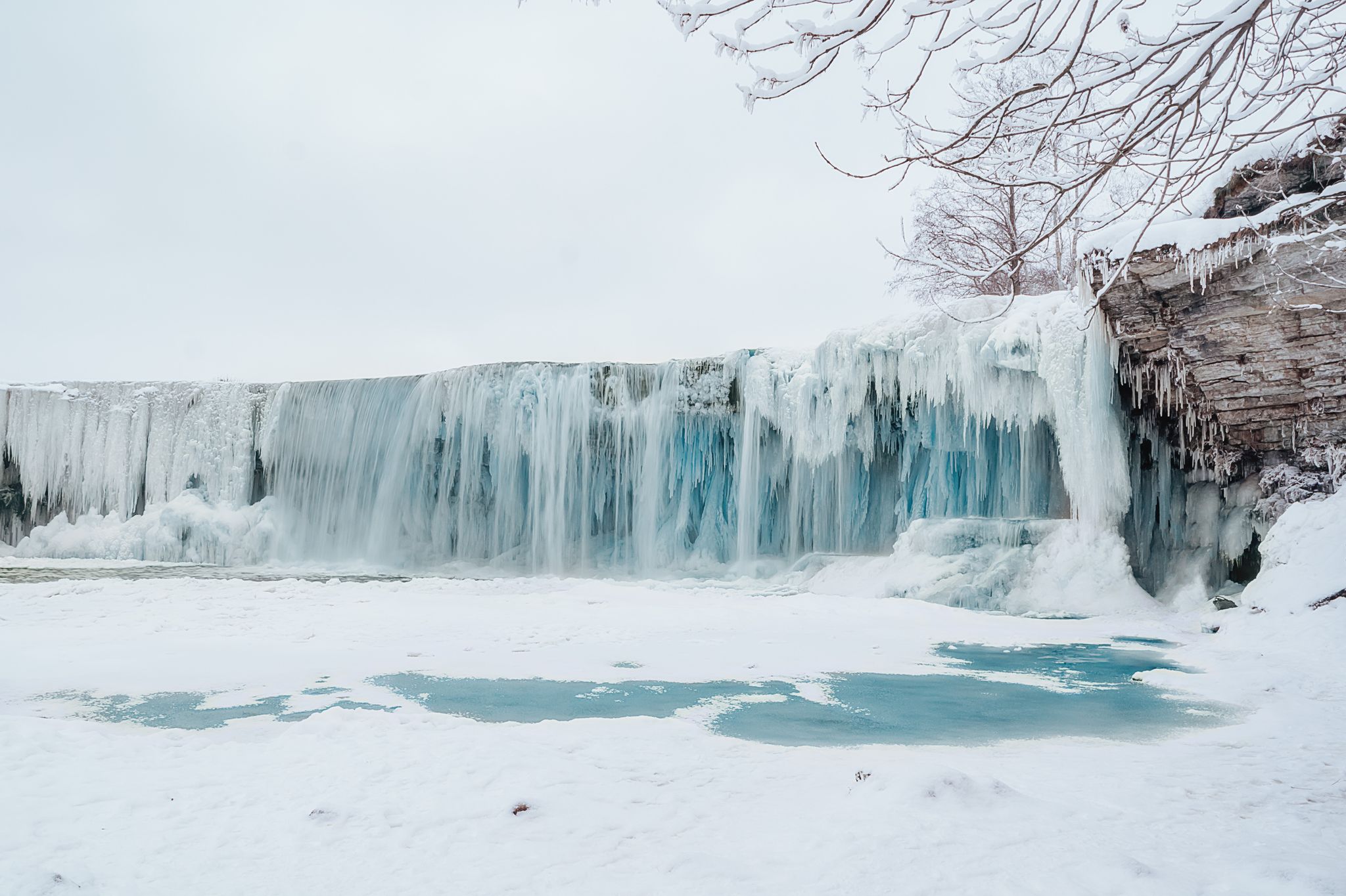 Photo of Keila Joa Blue Huge Iced Waterfall Winter Frozen Landscape in Tallinn ,Estonia.