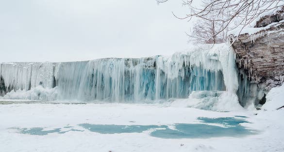 Photo of Keila Joa Blue Huge Iced Waterfall Winter Frozen Landscape in Tallinn ,Estonia.