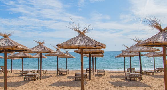 Photo of umbrellas in sunny Golden Sands in Varna, Bulgaria.