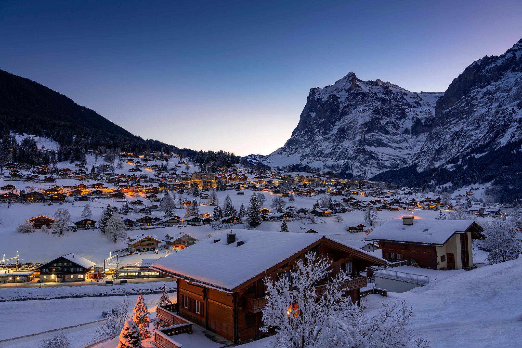 Photo of Winter landscape in Grindelwald at sunrise, behind the Mittelhorn and Wetterhorn, in the Bernese Oberland - Switzerland .