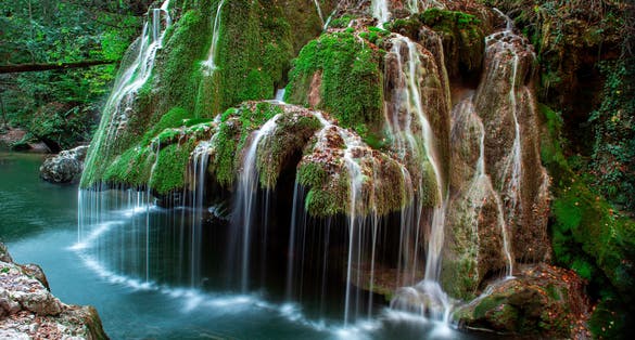 Photo of Bigar water fall, Romania, formed by an underground water spring witch spectacular falls into the Minis River.