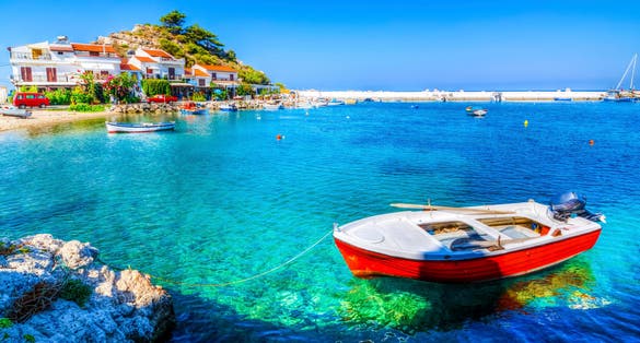 Photo of Kokkari Village beach view. Kokkari Village is populer tourist destination in Samos Island.