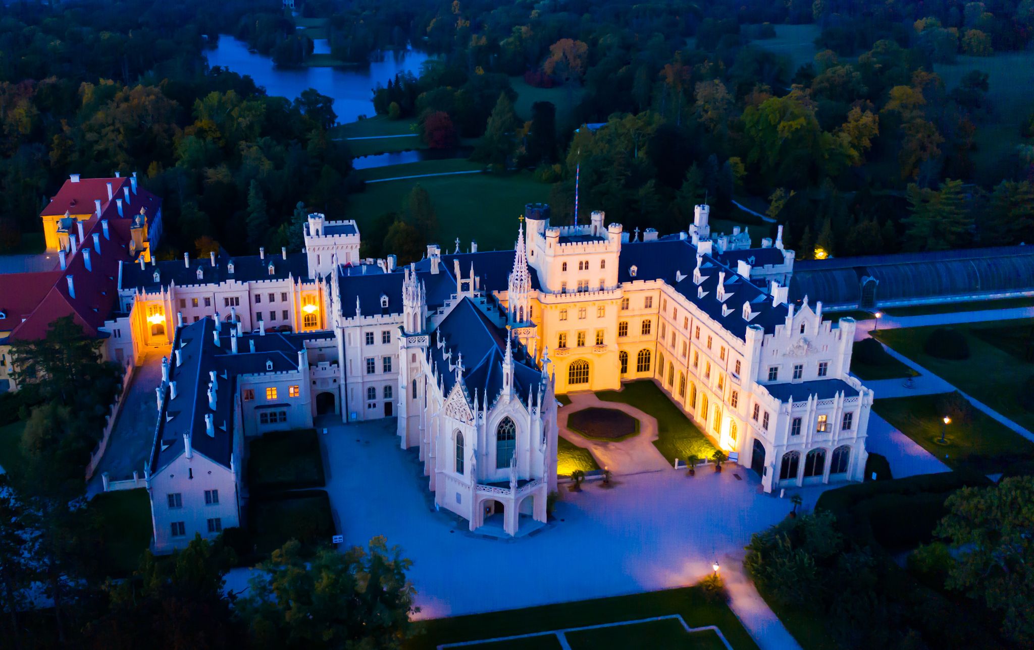 Photo of panoramic view of medieval castle Lednice by night Czech Republic.