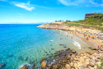 Beautiful sea lagoon with beach and tourists, Salou, Spain.