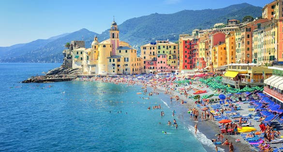 Photo of Sand beach in Camogli by Genoa, Italy.