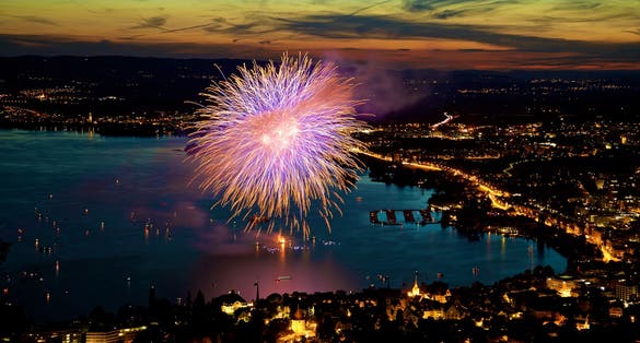 photo of fireworks in the lake Zug view from Zugerberg at night in Switzerland.