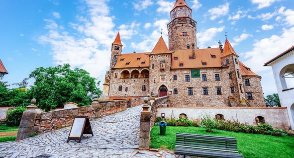 Photo of Bouzov fairytale castle in Czech highland beautiful landscape.