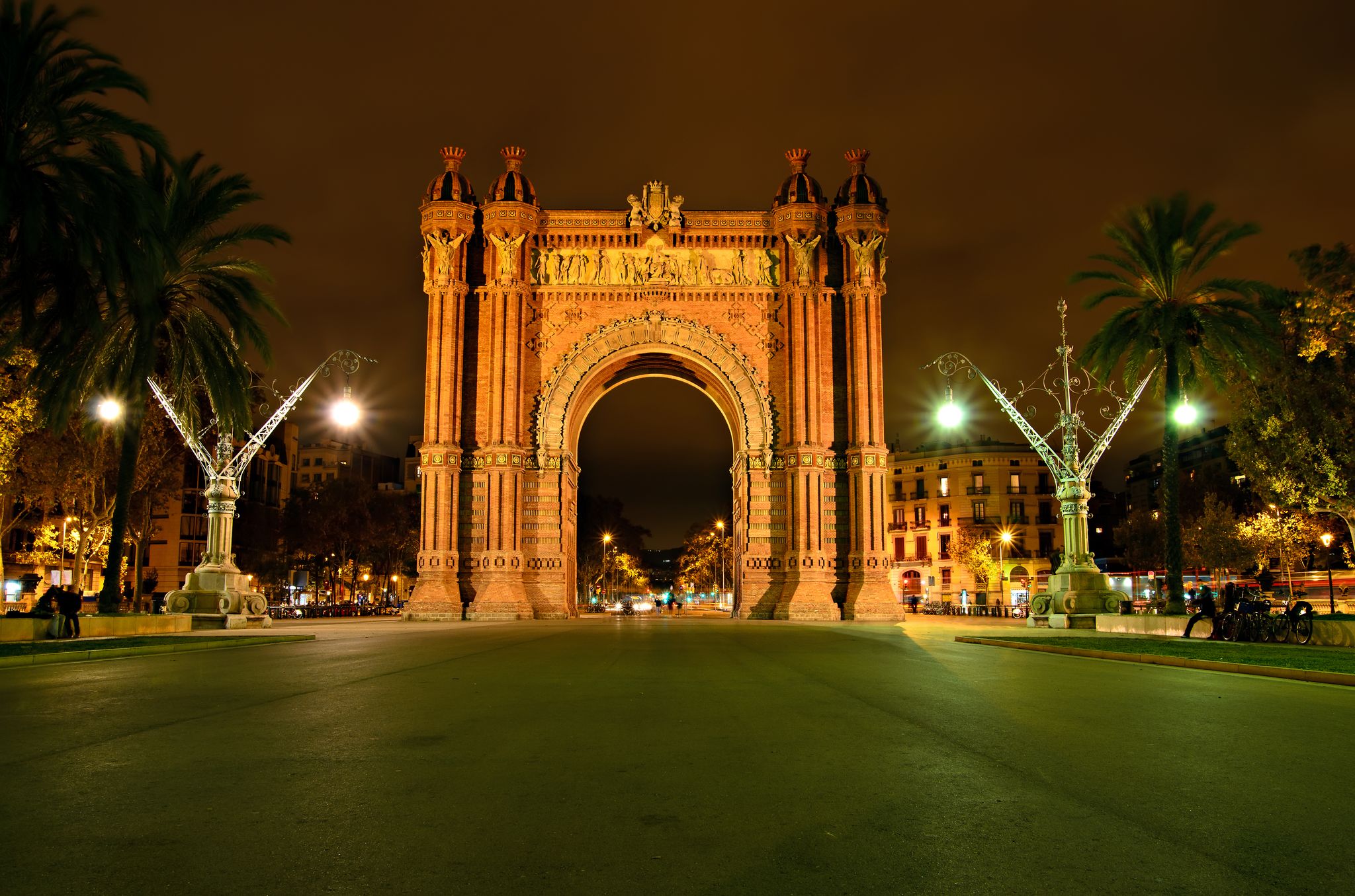 Photo of The Arc de Triomf, archway structure in Barcelona, Spain, at night.