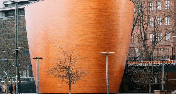 Photo of Kamppi Chapel Also Known As Chapel Of Silence Located On Narinkka Square, Helsinki, Finland.