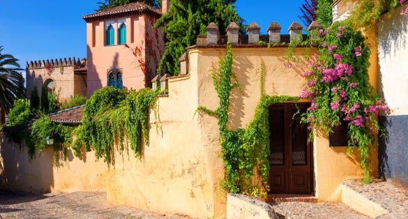 Photo of old architecture of Albaicin neighborhood. Granada, Spain.