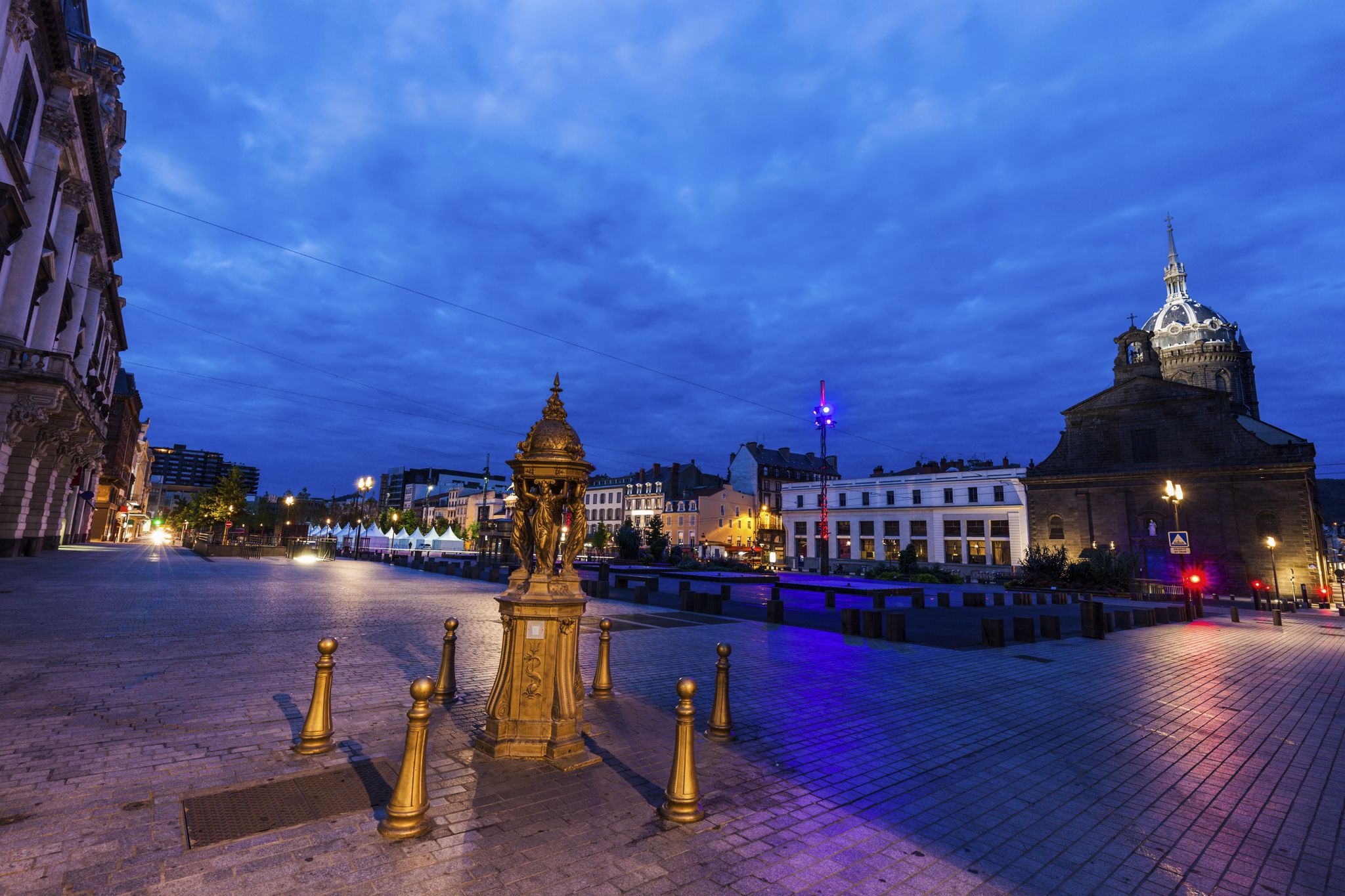 photo of Saint-Pierre les Minimes Church on Place de Jaude at night in Clermont-Ferrand, Auvergne-Rhone-Alpes, France.