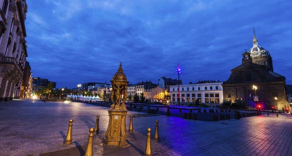 photo of Saint-Pierre les Minimes Church on Place de Jaude at night in Clermont-Ferrand, Auvergne-Rhone-Alpes, France.