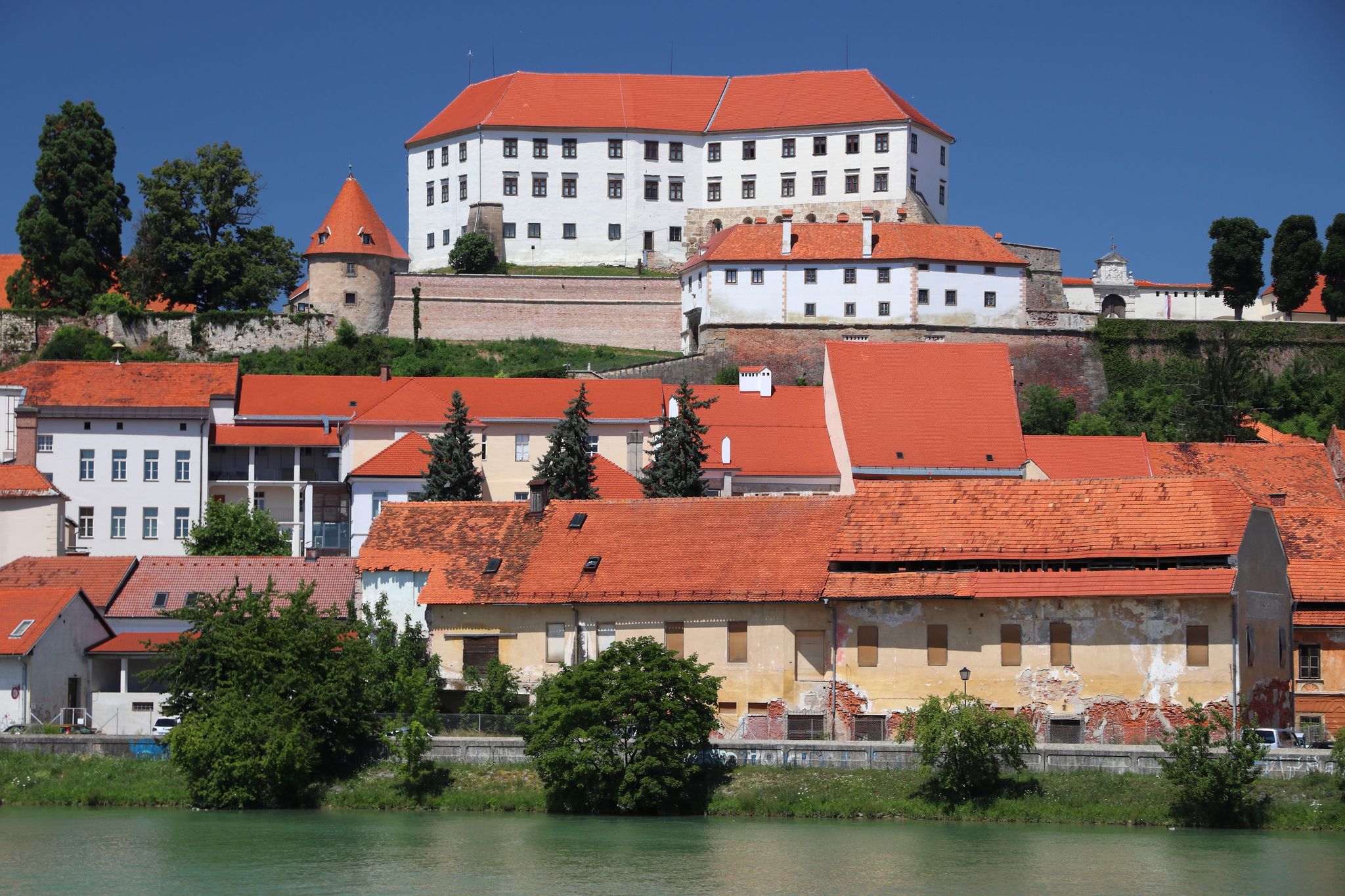 Photo of Ptuj Castle in Slovenia. Medieval landmark alongside Drava river in Ptuj.