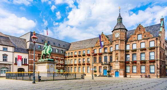 photo of view of Dusseldorf, West Rhine Westphalia, Germany: The old town, market square, town hall and the equestrian statue of Jan Wellem (Johann Wilhelm II),Stuttgart Germany.