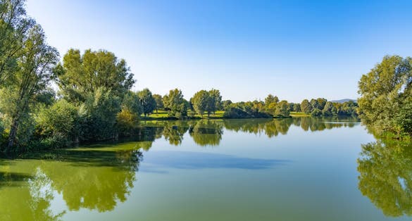 photo of view of Beautiful panorama of the lake landscape on a summer day in the Fuldaaue in Kassel, Germany,Kassel Germany.