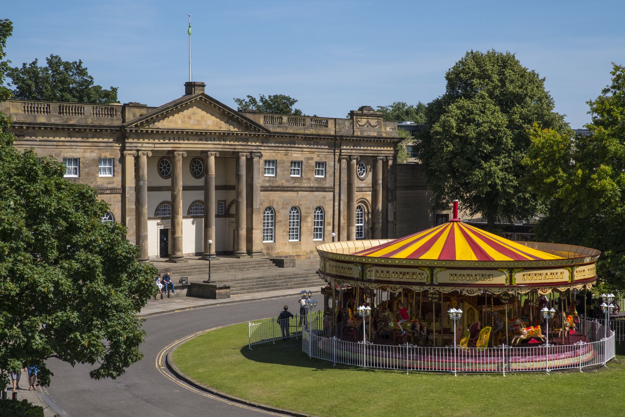 Photo of the York Castle Museum and a Merry-go-round in the historic city of York, England.