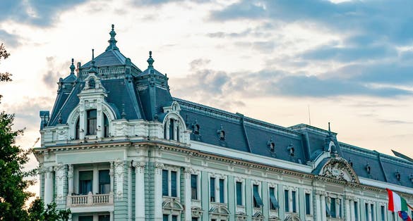 photo of view of View on the historic architecture of Nyiregyhaza, Hungary, Europe on at night with stormy clouds on the sky.