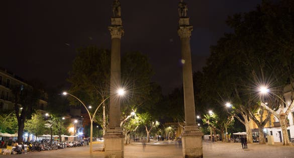 Photo of La Alameda de Hercules in Seville at Night, Spain .