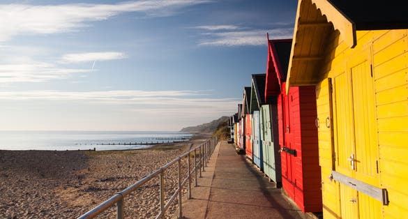 Photo of Colorful beach huts on the Cromer beach, UK.