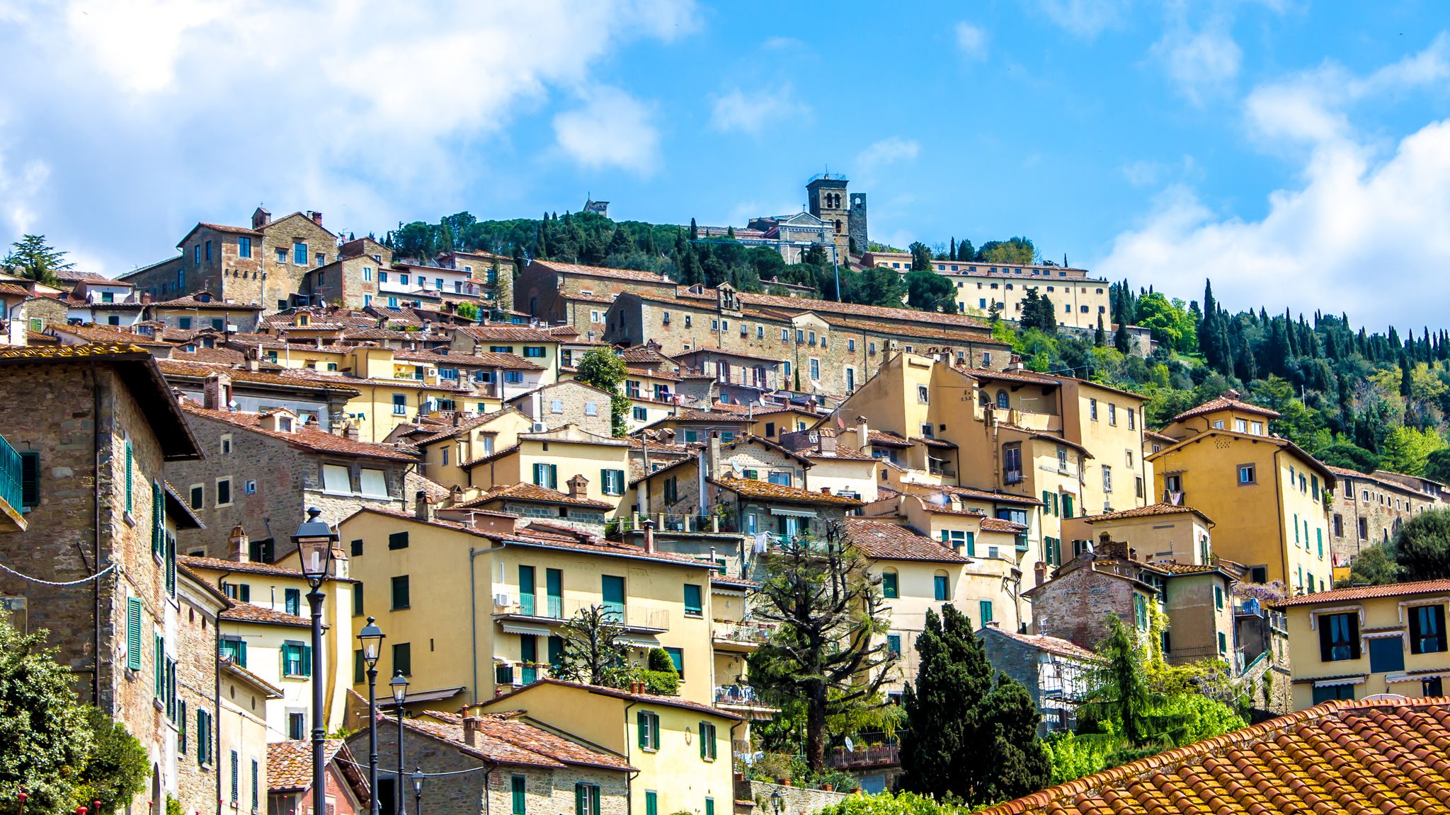 Photo of cityscape of Cortona, a medieval town in Tuscany, Italy.