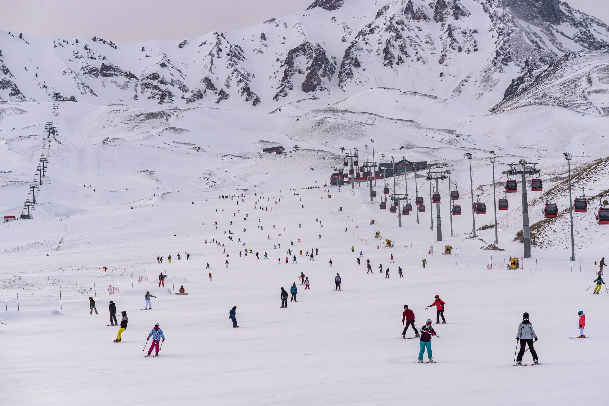 photo of people skiing in Erciyes ski resort. Snowy Mount Erciyes in Kayseri, Turkey.