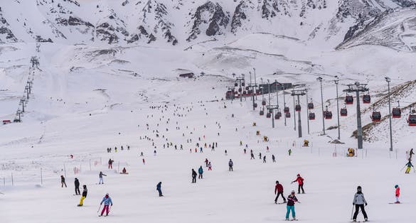 photo of people skiing in Erciyes ski resort. Snowy Mount Erciyes in Kayseri, Turkey.
