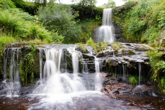Picture of a waterfall taken at Blaen y Glyn Uchaf, Merthyr Tydfil, Wales. This place has several small and large waterfalls which you can follow all the way down.