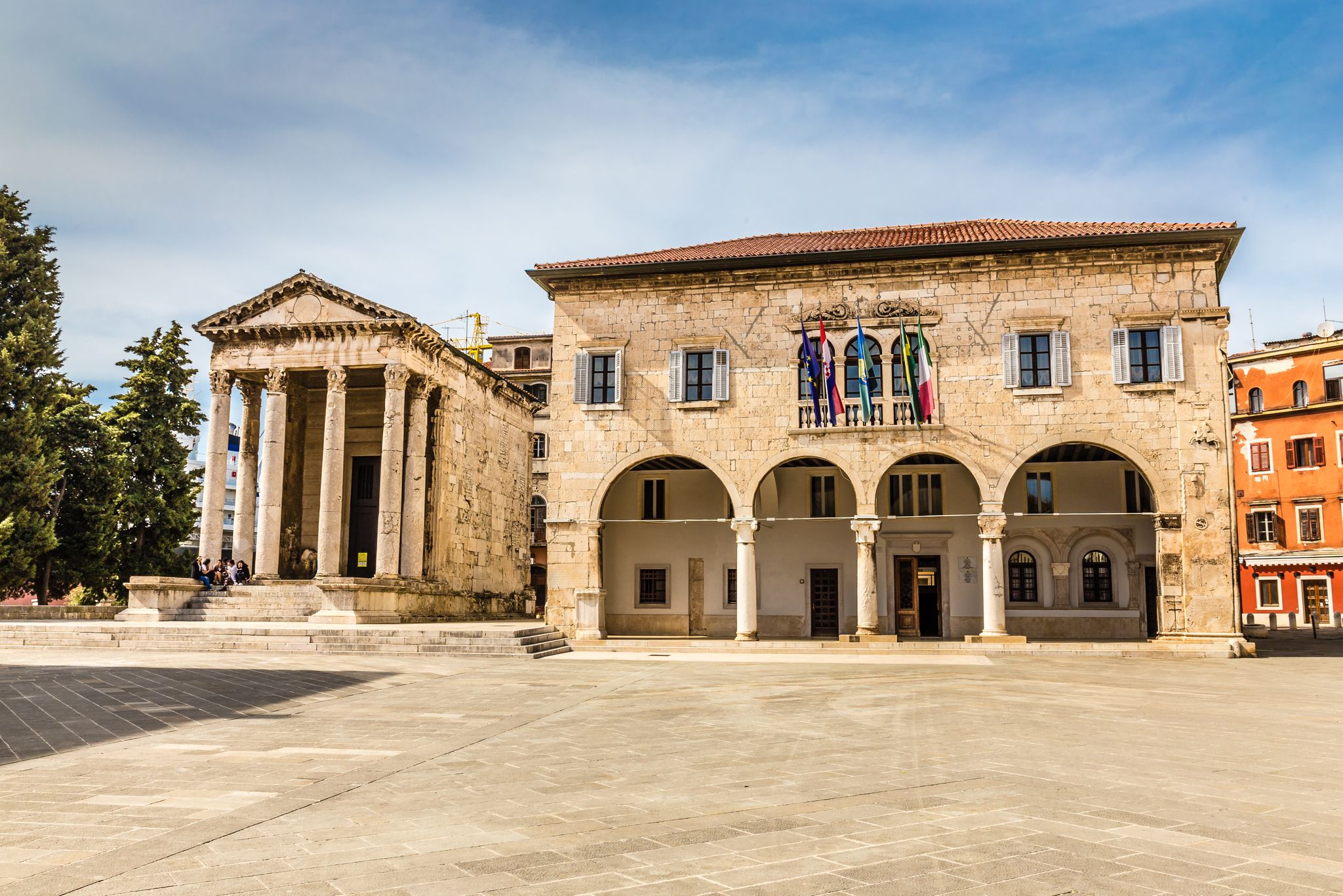 Photo of Ancient Temple Of Augustus With Corinthian Columns And Communal Palace. Pula, Istria, Croatia.