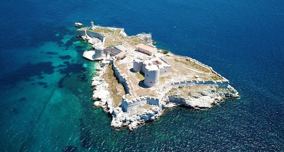 photo of aerial view of the Château d'If It was a fortification and a jail in Marseille, France.