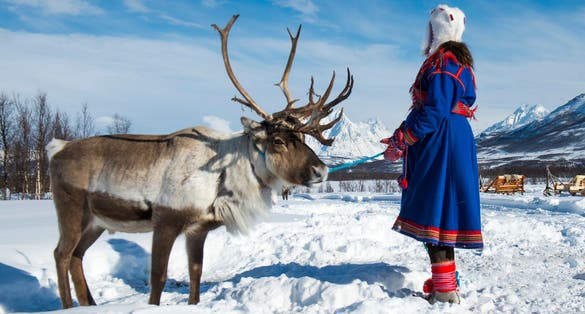 Northern Norway, a traditional dressed Sami woman .Tromso Lapland