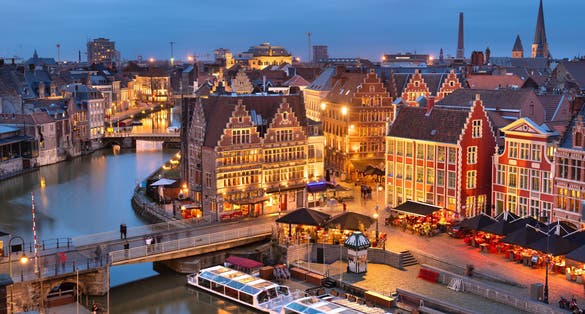 Ghent, Belgium old town cityscape from the Graslei are at dawn.