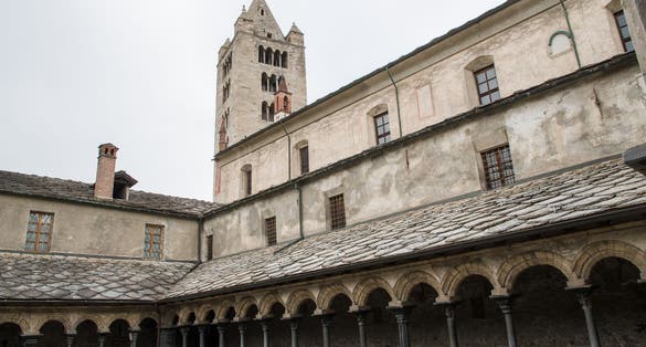 Cloister and Bell Tower in Church of Sant'Orso (or Saint-Ours), Aosta, Valle d'Aosta, Italy.