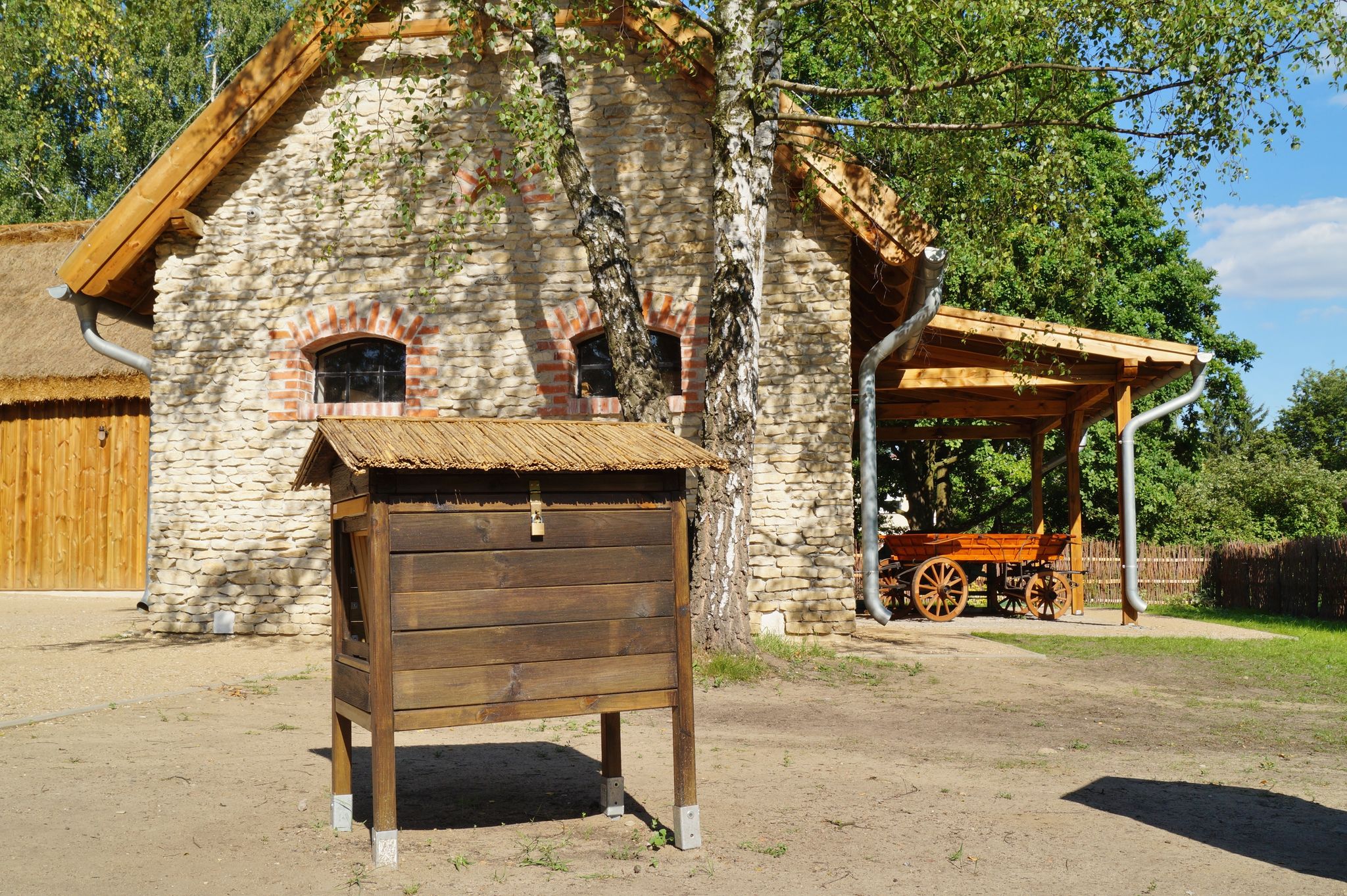 Bee hive and barn- Old wooden house for bees in retro style
