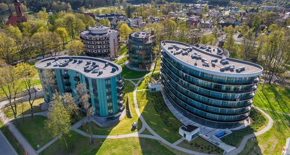 Aerial view of Druskininkai city in Lithuania during summer day, which is a popular tourist destination due to variety of Spa and health facilities and famours for it's natural mineral water