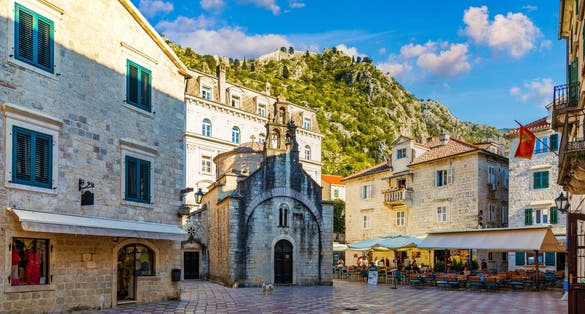 Photoof View of the old town of Kotor, Montenegro. Bay of Kotor bay is one of the most beautiful places on Adriatic Sea. Historical Kotor Old town and the Kotor bay of Adriatic sea, Montenegro.