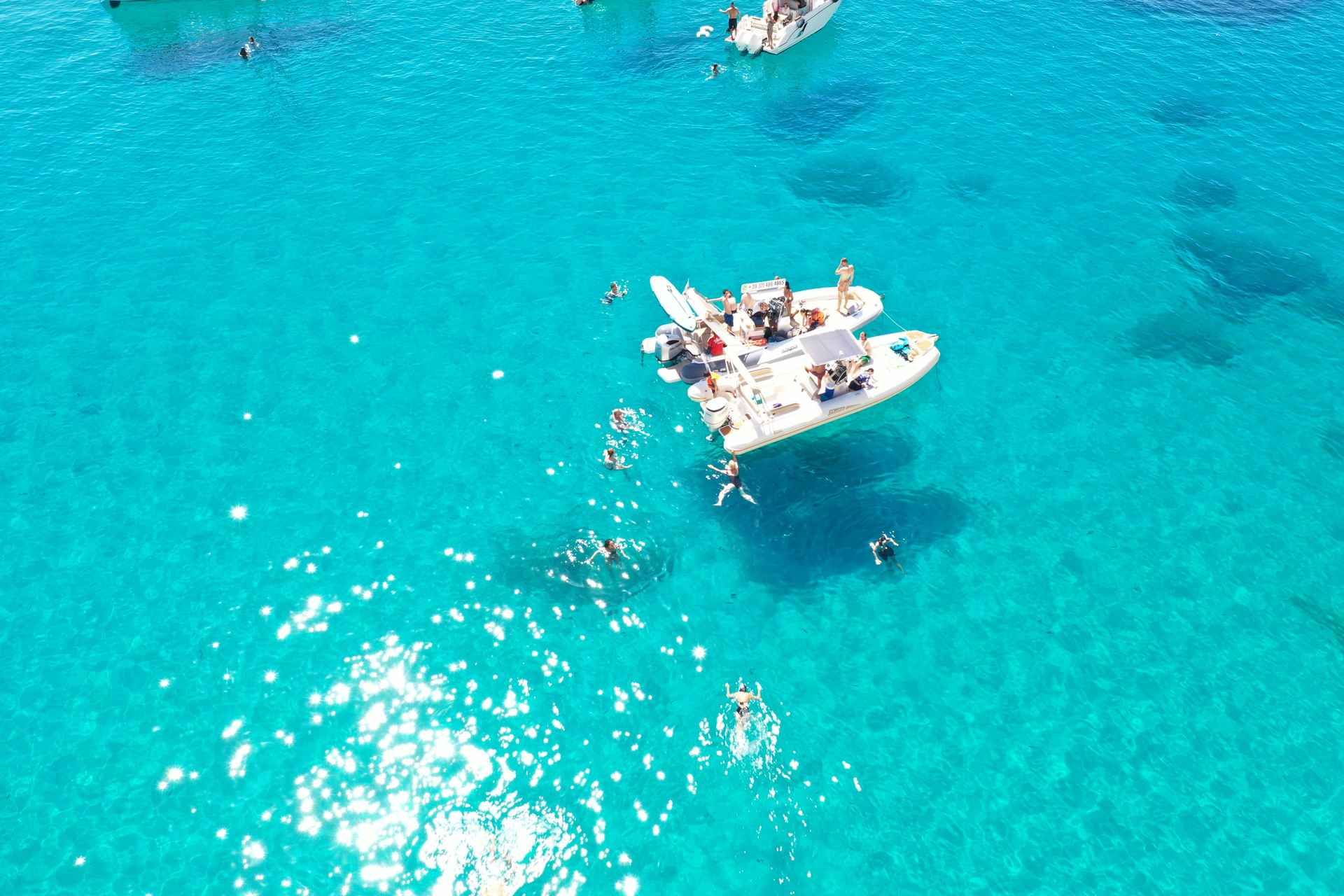 Cagliari: Boat Tour, 4 Stops, Swim, Snorkeling, & 1 Spritz