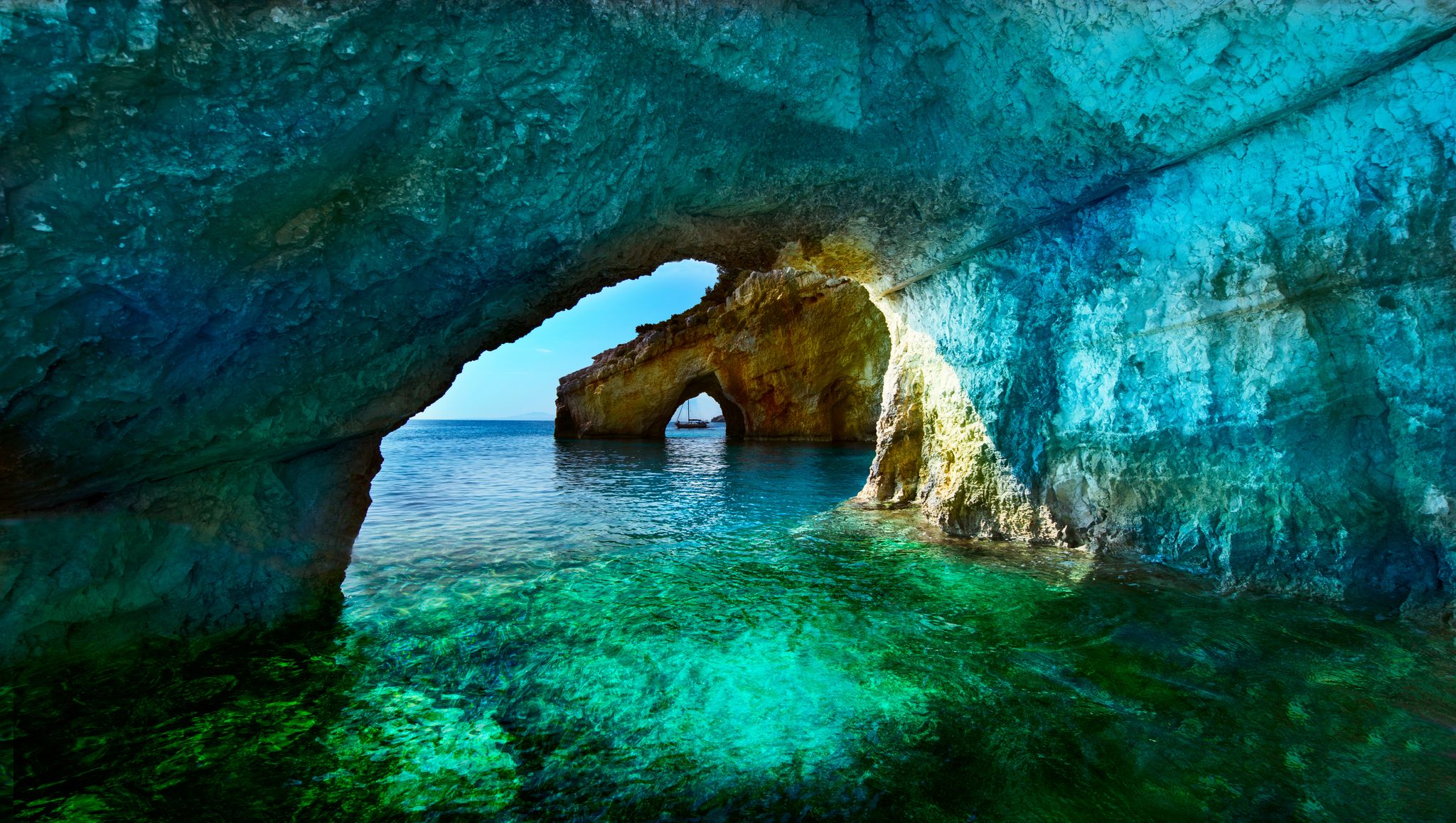 photo of view of Greece, The island of Zakynthos. One of the most beautiful blue caves in the world. The Ionian Sea. Blue caves of the island of Zakynthos, Greece.