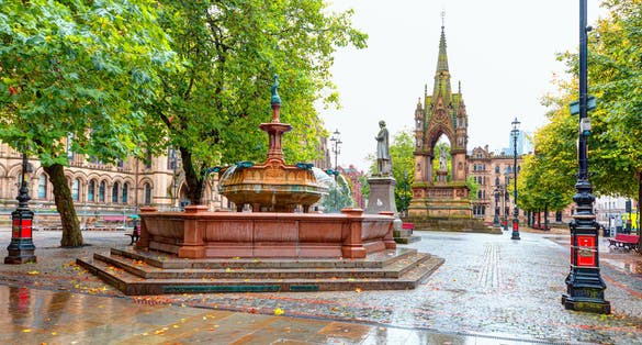 Photo of Albert Memorial, Albert Square in front of Manchester Town Hall,UK.