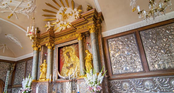 photo of August 12, 2016 Vilnius, Lithuania. Holy picture of mother of god, Gate of dawn view from the gate of dawn (Ostra brama).