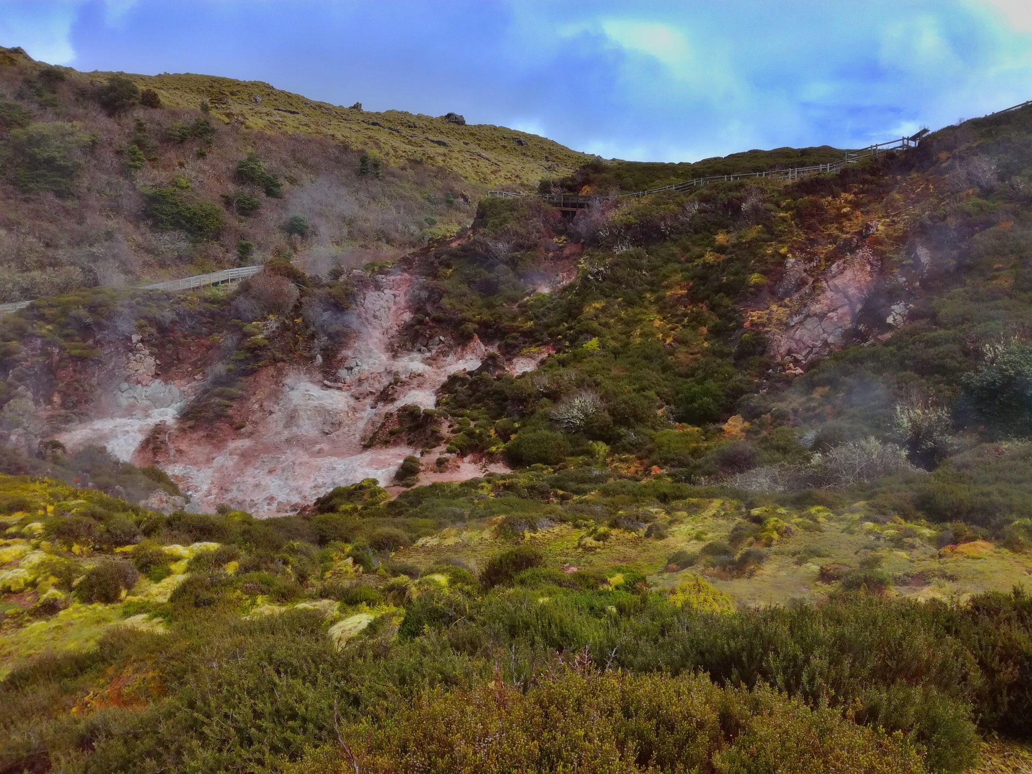 Landscape view of volcanic sulfur fumes in Furnas do Enxofre on Terceira island.