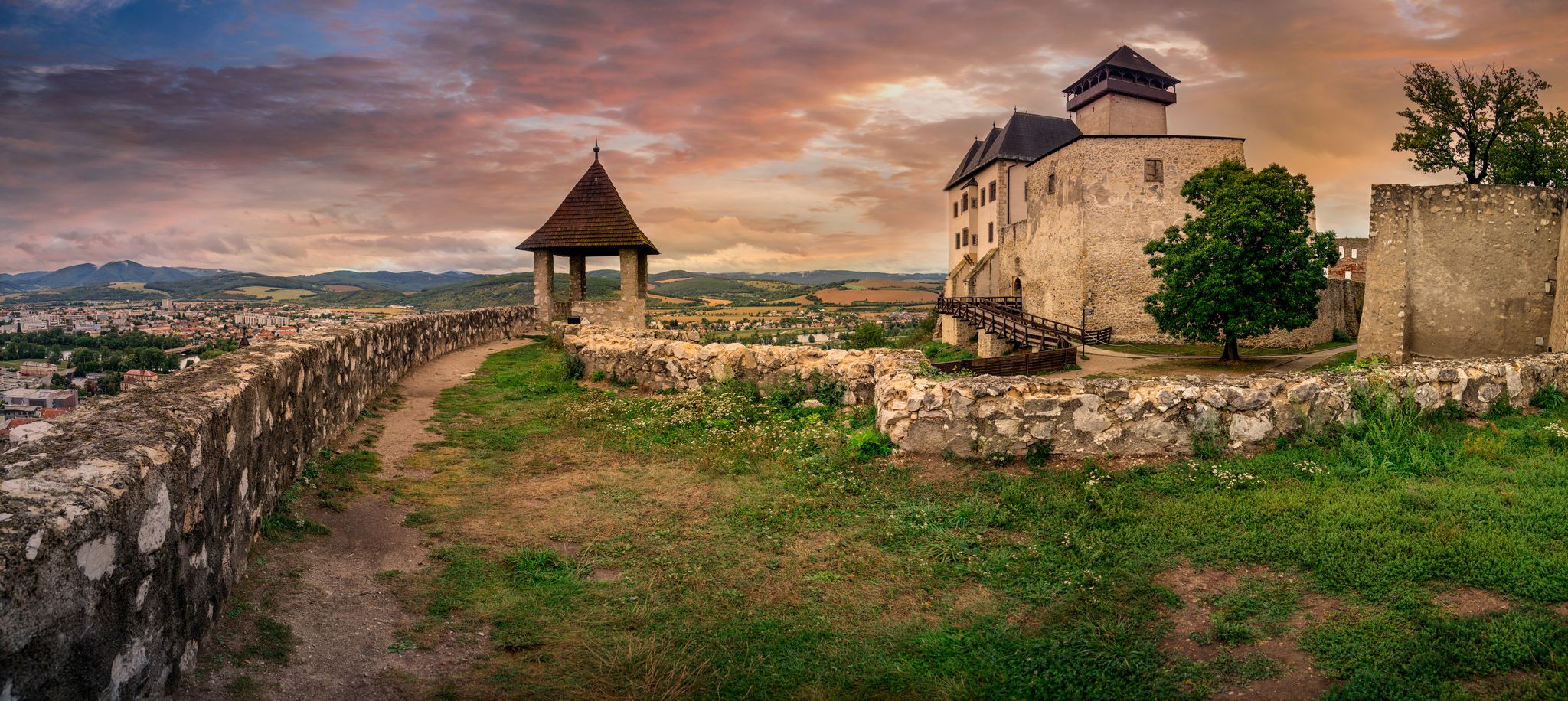 The inner Gothic castle in Trencin Slovakia with Renaissance palace and castle gate dramatic stormy sky