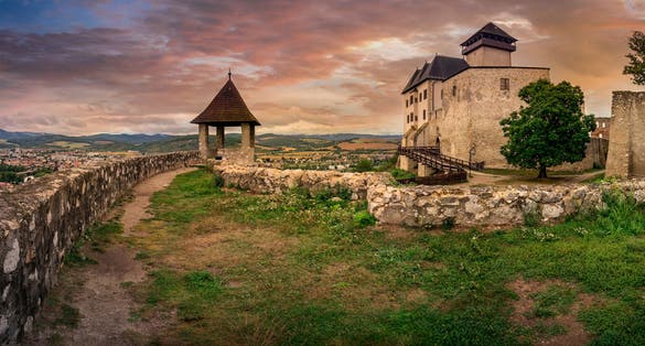 The inner Gothic castle in Trencin Slovakia with Renaissance palace and castle gate dramatic stormy sky