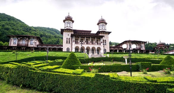 photo of view of Old Castle casino at Slanic Moldova, Romania. Old casino and castle hotels in Slanic Moldova, Bacau, Romania.