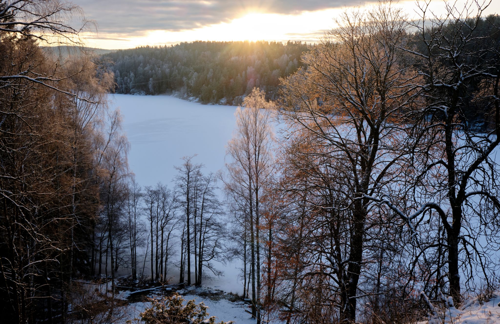Fantastic view on a frozen lake from top of a hill east from Oslo, Østmarka, close to the Sarabråten ruins