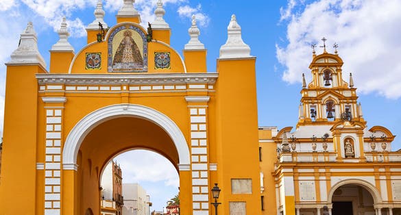 Photo of macarena door arch in seville, spain .