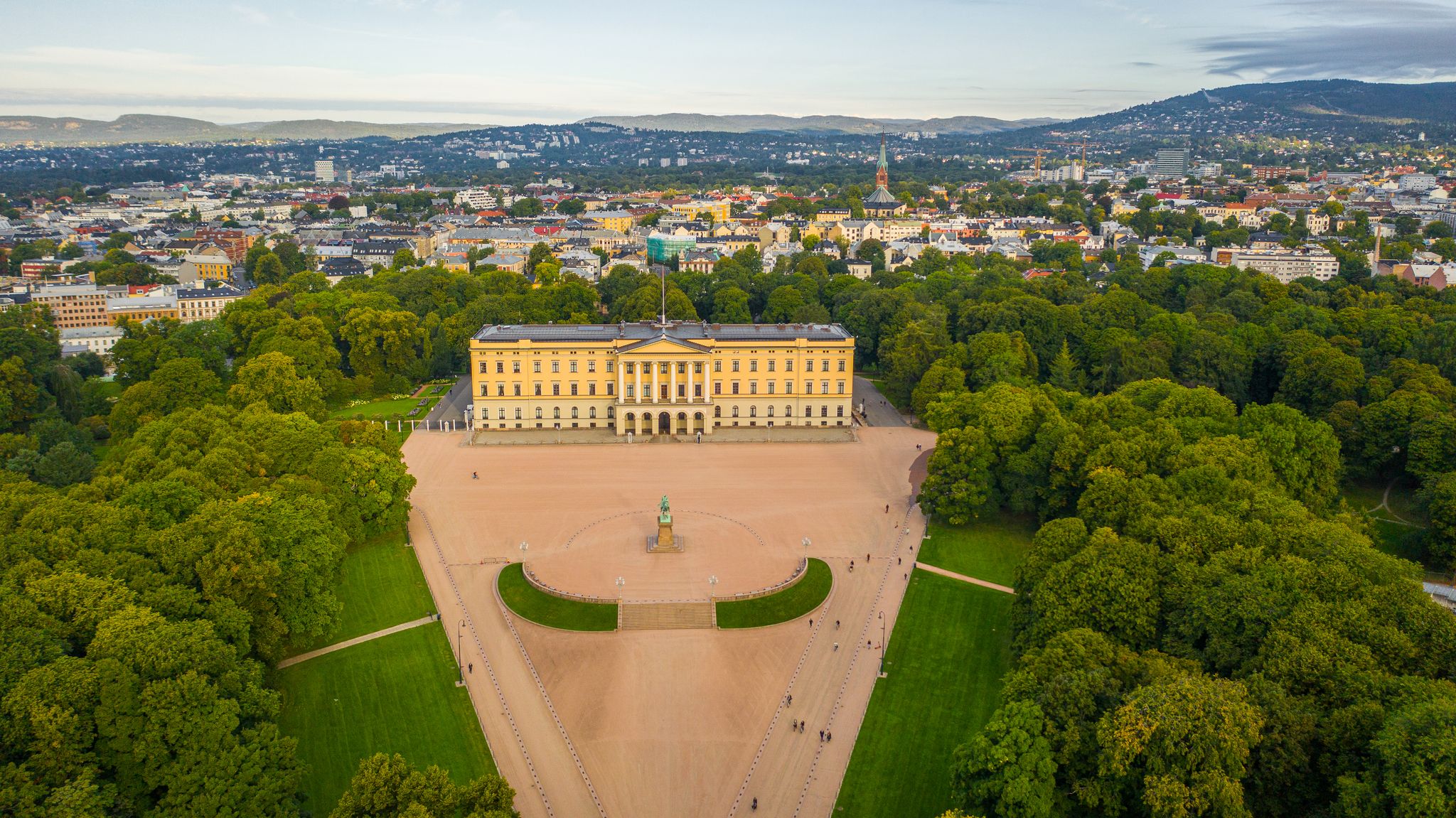 Photo of beautiful panoramic aerial view photo from flying drone to of the Royal Palace and Statue of King Karl Johan Oslo, Norway.