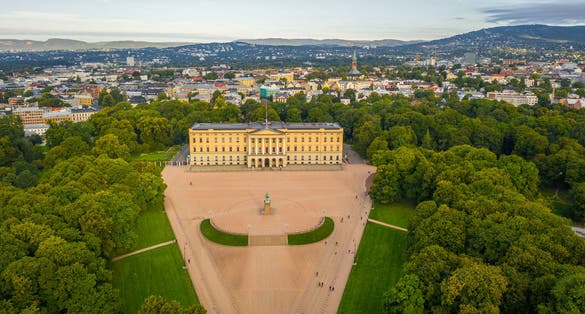 Photo of beautiful panoramic aerial view photo from flying drone to of the Royal Palace and Statue of King Karl Johan Oslo, Norway.
